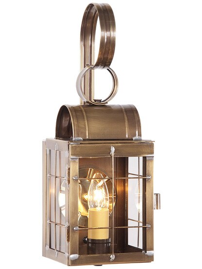 Toll House Suspended Wall Lantern in Weathered Brass.